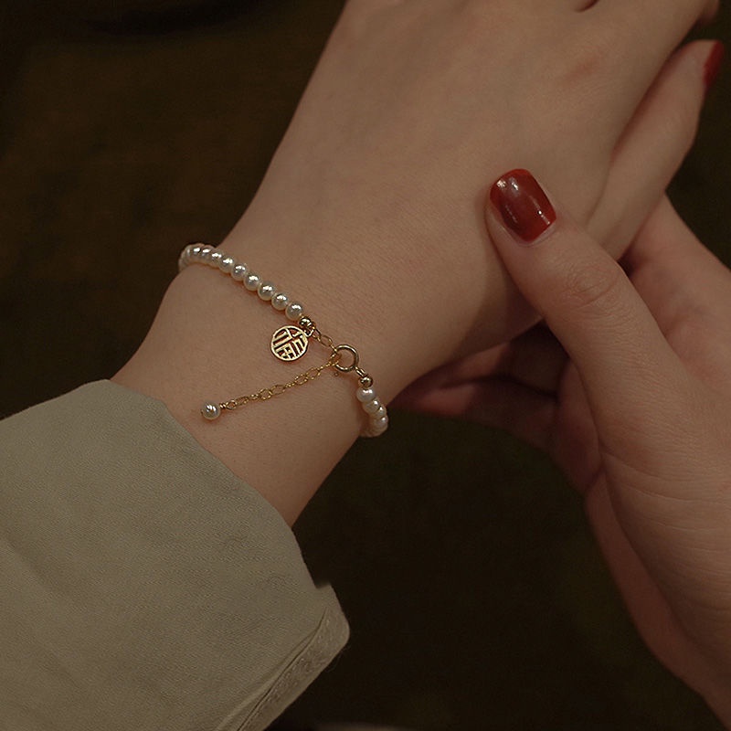 Gelang Manik-Manik Mutiara Keberuntungan Model Hollow out Fu Gaya Retro Adjustable Untuk Wanita