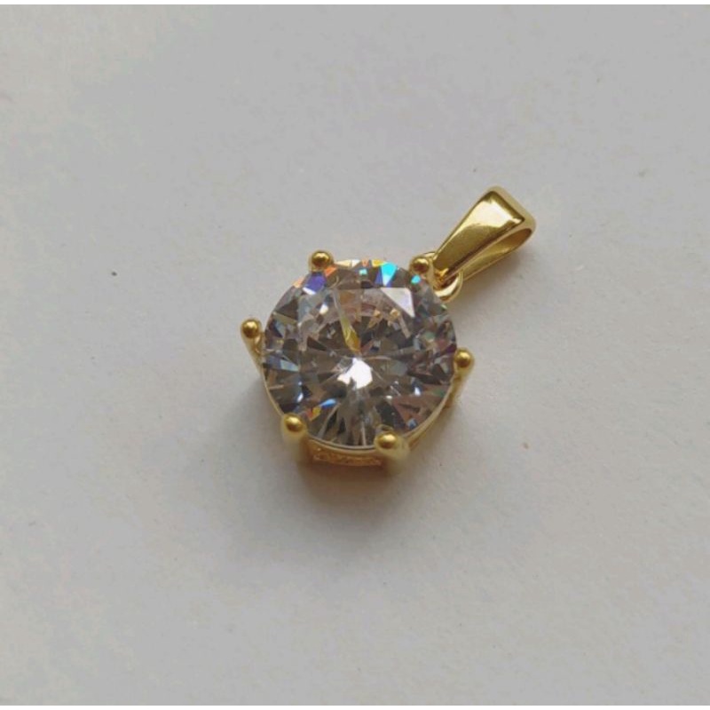 liontin  motif mata satu titanium anti karat