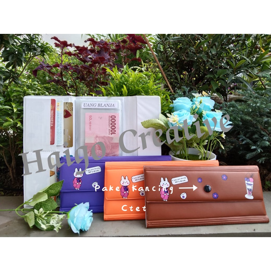 DOMPET ORGANIZIER MOTIF BONEKA-PENUTUP PAKE KANCING