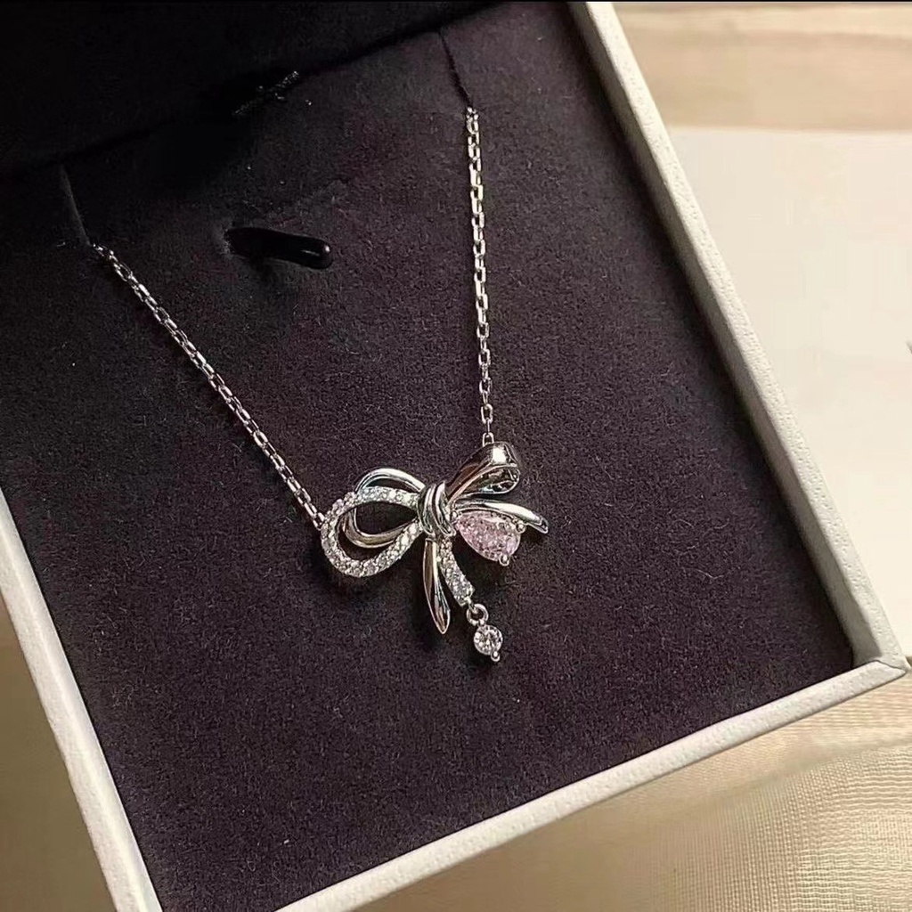 Kalung Rantai Liontin Pita Hias Kristal Zircon Imitasi Bahan Alloy Untuk Wanita