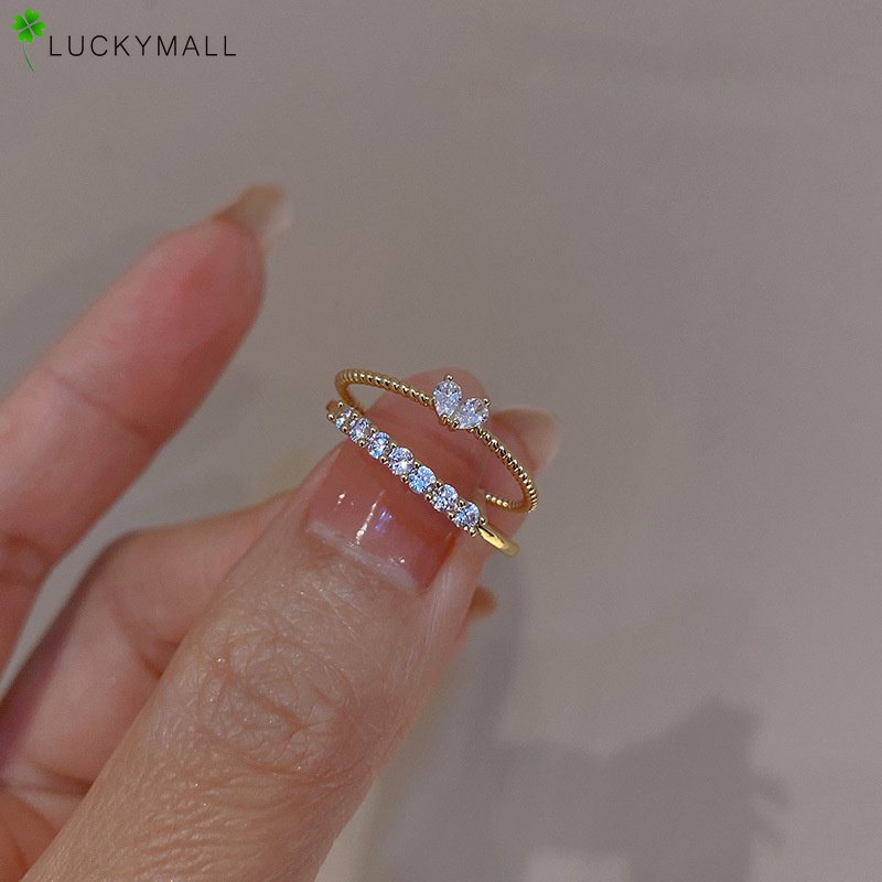 2pcs / Set Cincin Zircon Bentuk Hati Warna Emas Untuk Wanita