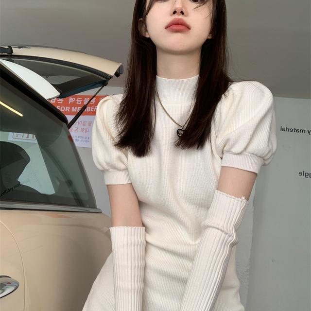 Red Rasa desain Natal merah rajutan rok setengah tinggi kerah ramping pinggang tas pinggul rok musim dingin engah lengan gaun perempuan