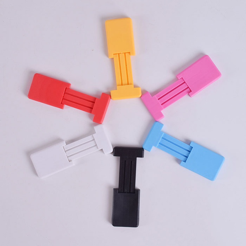 1pc Stand Holder Ponsel Universal Mini Portabel Dapat Ditarik Warna Permen Bahan Plastik Untuk Meja