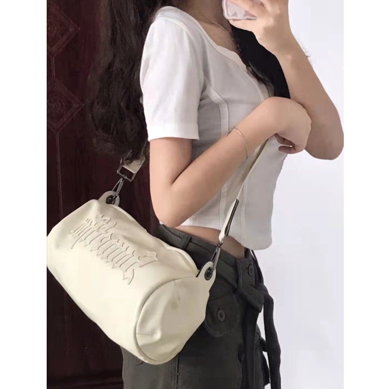 Sera Niche Gothic Huruf Stiker Bordir Kasual Warna Solid Messenger Tas Silinder Wanita 2022 Baru Satu Bahu Messenger Tas Pasang