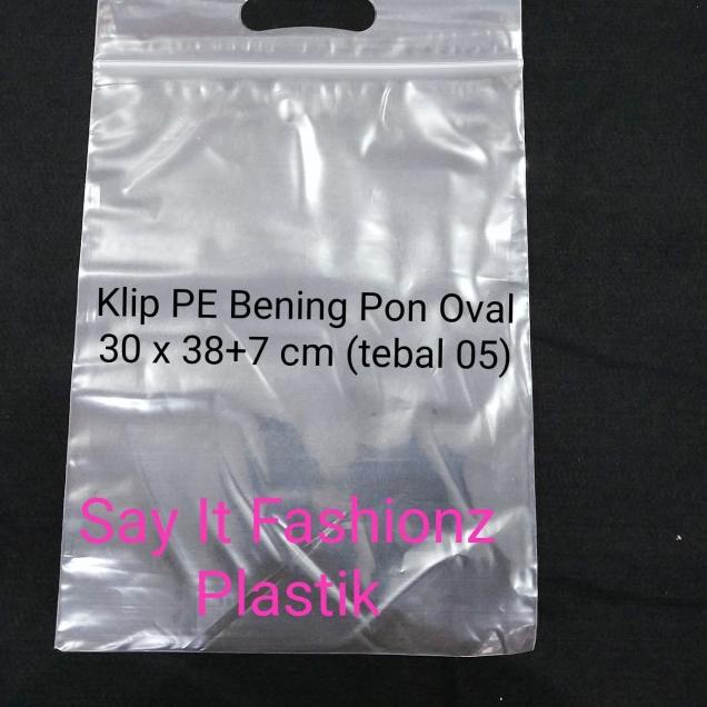 

Kantong Plastik Klip Pon Oval PE Bening 30x38+7cm tebal 05 isi 100lbr