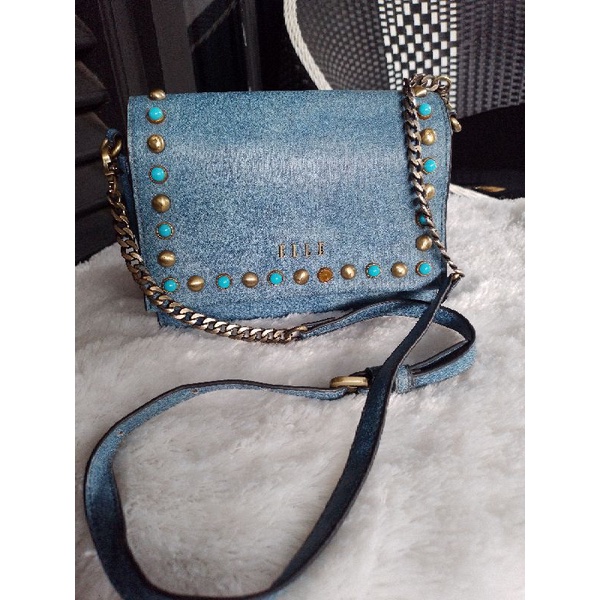 tas second sling elle