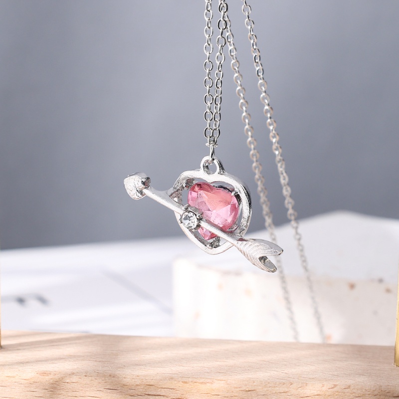 Kalung Klavikula Hias Liontin Hati Panah Cupid Aksen Kristal Pink Model Rongga Untuk Hadiah