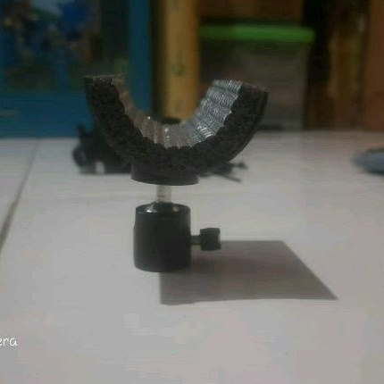 Dudukan senapan untuk tripod