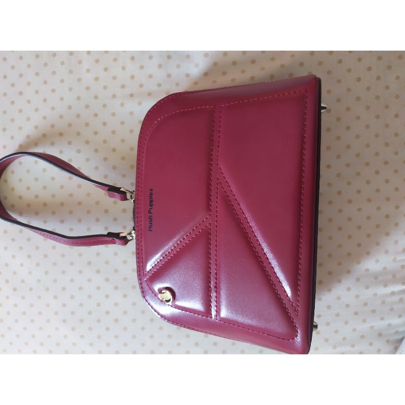 tas merah hush puppies