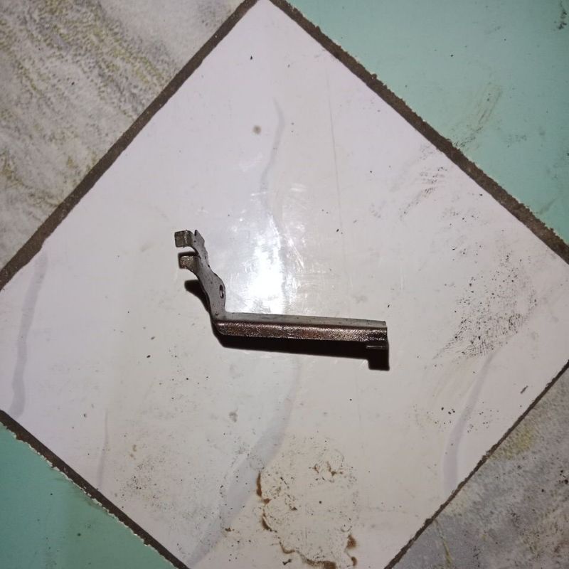 plat penahan spul megapro primus original