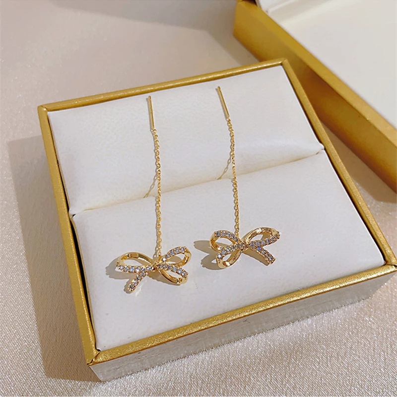 Anting Tusuk Gantung Wanita Desain Pita Hias Zircon Gaya Elegan / Korea Untuk Pesta / Pernikahan