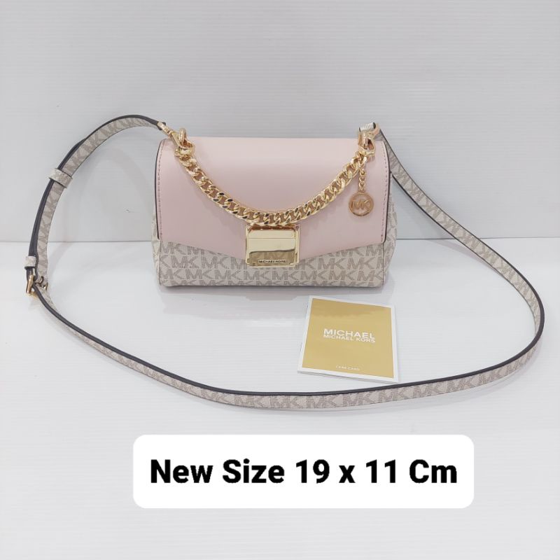 sling bag MK sign vanilla pink