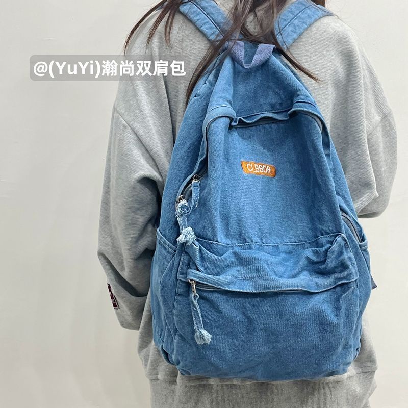 Sera mahasiswa Amerika high street retro denim ransel tua dicuci tas sekolah malas siswa ransel untuk pria dan wanita