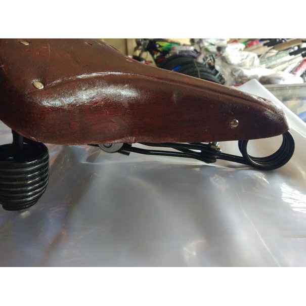 sadel jok sepeda onthel kulit per gulung keong per rapat