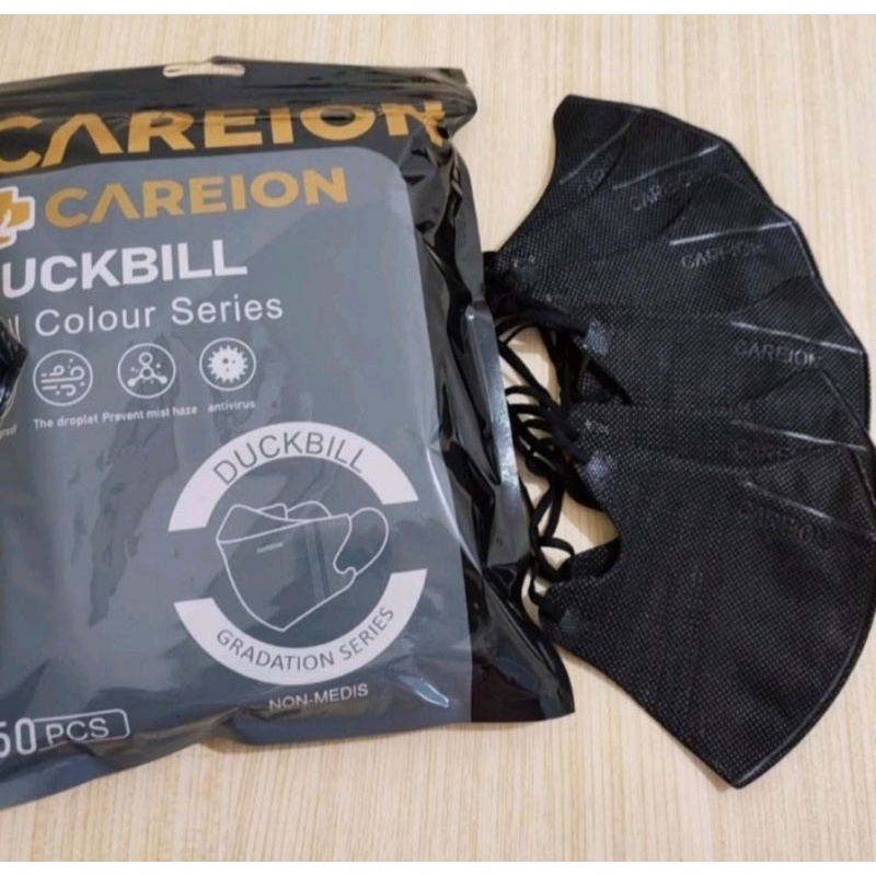 MASKER CAREION DUCKBILL 50 PCS ORI