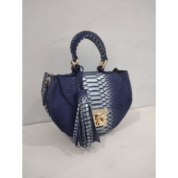 tas kulit ular dan bulu domba