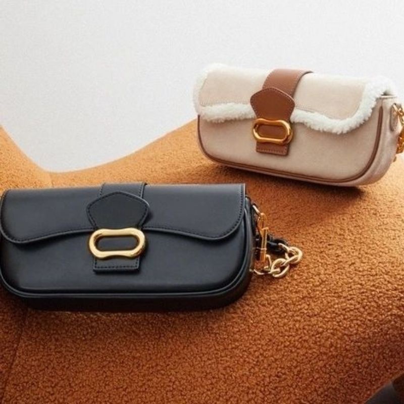 CK Daki Belted Curved Bag