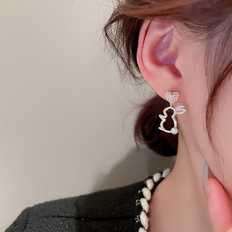 Anting Tusuk Desain Kelinci Hollow Hias Mutiaraberlian Imitasi Gaya Uniksimple Untuk Wanita