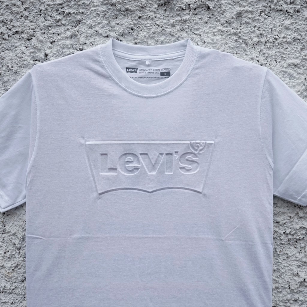 Kaos Levis Pria - Batwing Embos Putih