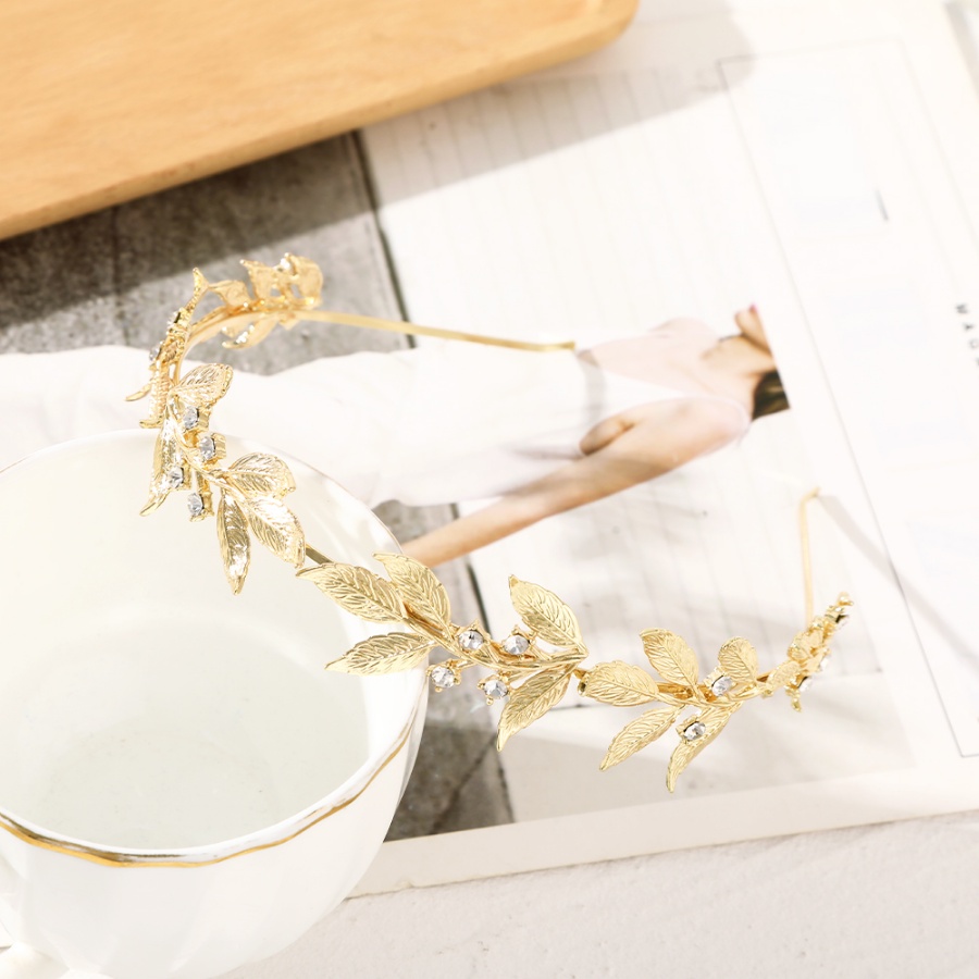 Headband Bentuk Daun Warna Emas Aksen Kristal Berlian Imitasi Bahan Alloy Gaya Korea Untuk Wanita