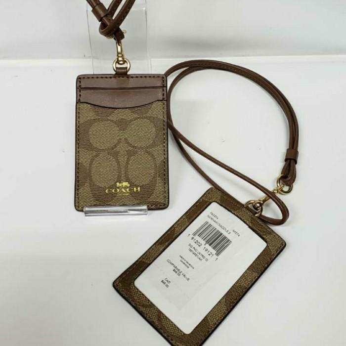 

coach sig pvc lanyard, khaki saddle.