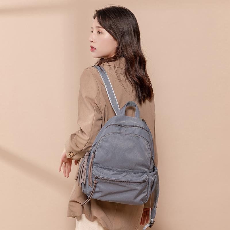 tas sekolah pria  ransel nilon ransel premium kain kanvas premium sera ransel wanita 2023 baru versi Korea dari pasang liar Oxford kain ransel fashion kasual tas travel berkapasitas besar