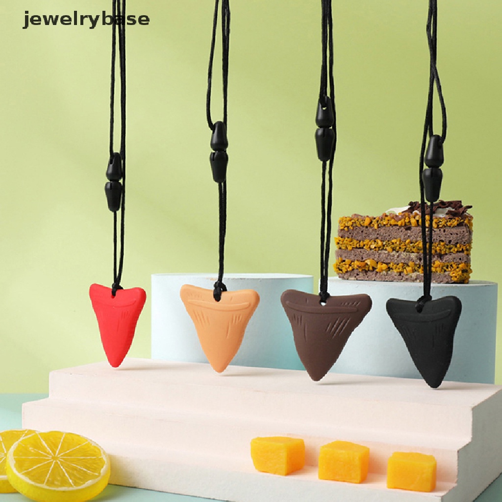 Mainan Kunyah Bentuk Segitiga Bahan Silikon Untuk Anak Autis