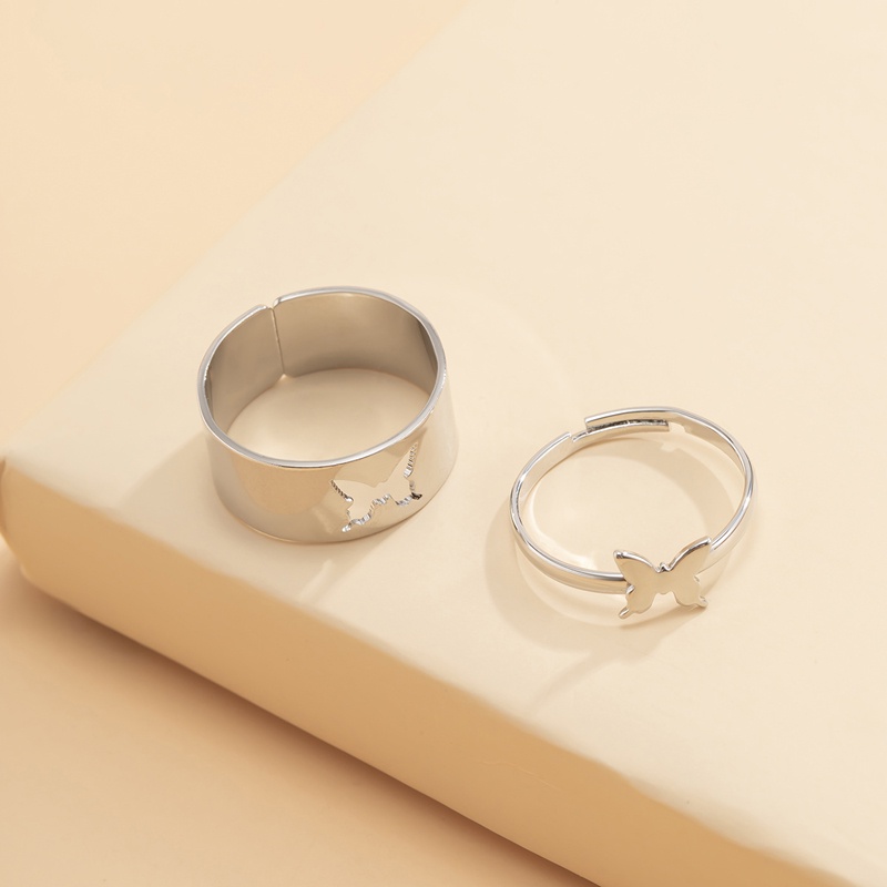 We Flower 2PCs / Set Cincin Desain Kupu-Kupu Hollow Gaya Punk Untuk Pria / Wanita