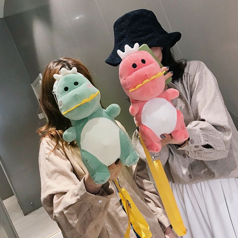tas selempang dinosaurus wanita yang lagi viral