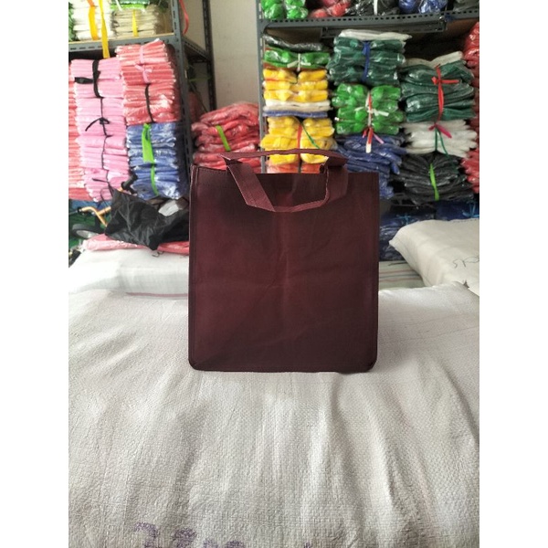 

Tas Spunbond Bok nasi polos jahit UK 22x22x27