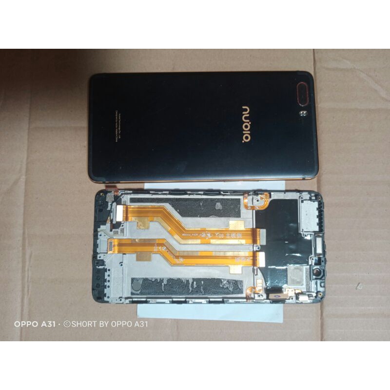 FRAME /TATAKAN UNTUK LCD  NUBIA M2 NX551J FULLSET FULL ASSESORIS PLUS BACKDORE ORI 100% COPOTAN MULU