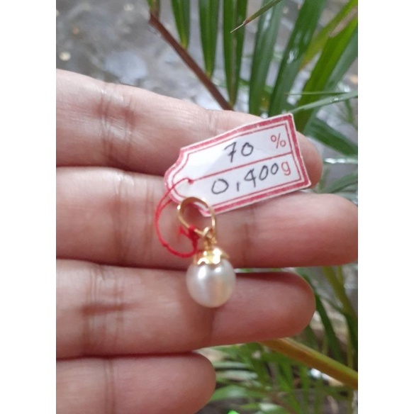 liontin emas mutiara laut