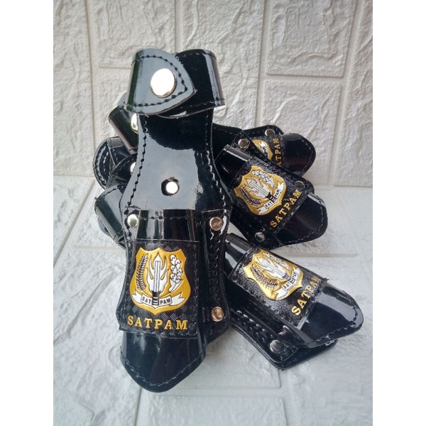 sarung tongkat satpam kilap