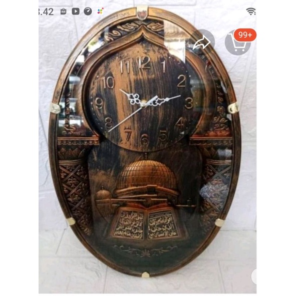 jam dinding kaligrafi oval