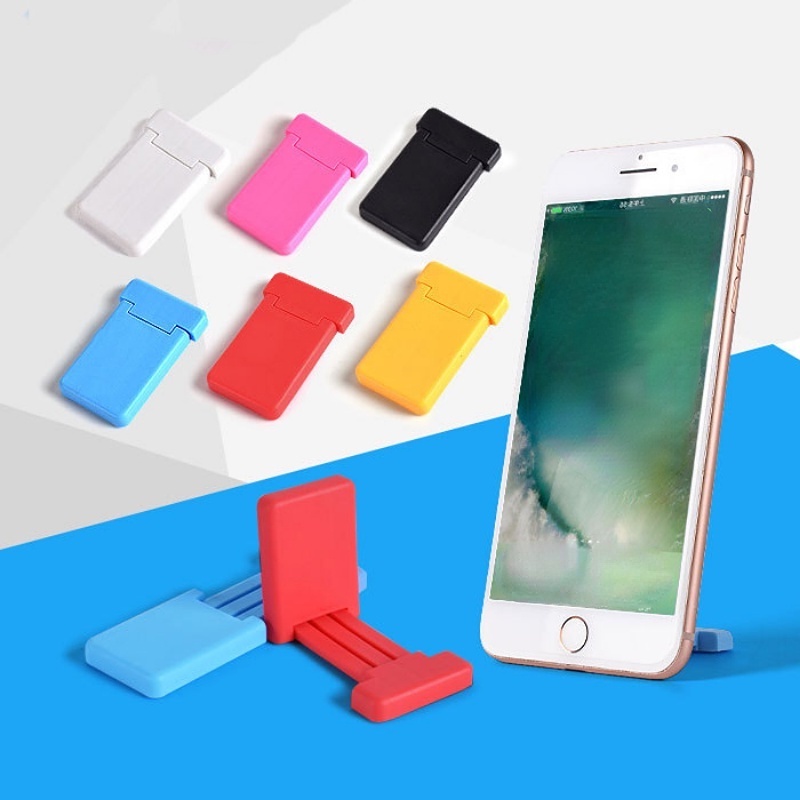 1pc Stand Holder Mini Portable Universal Bahan Plastik Warna Permen Untuk Smartphone