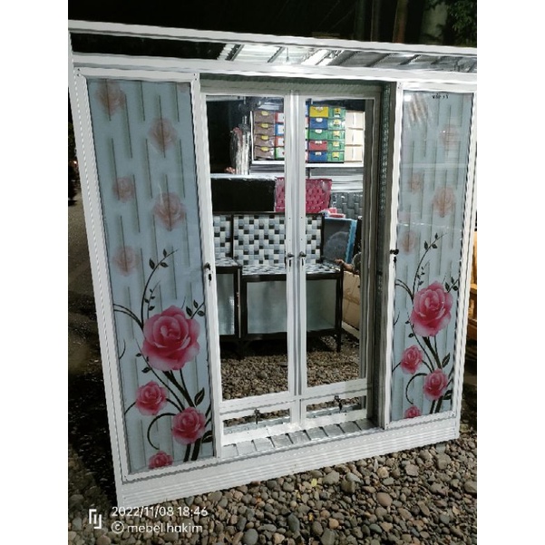 Lemari Baju Minimalis pintu Geser Bahan Stenlis + kaca