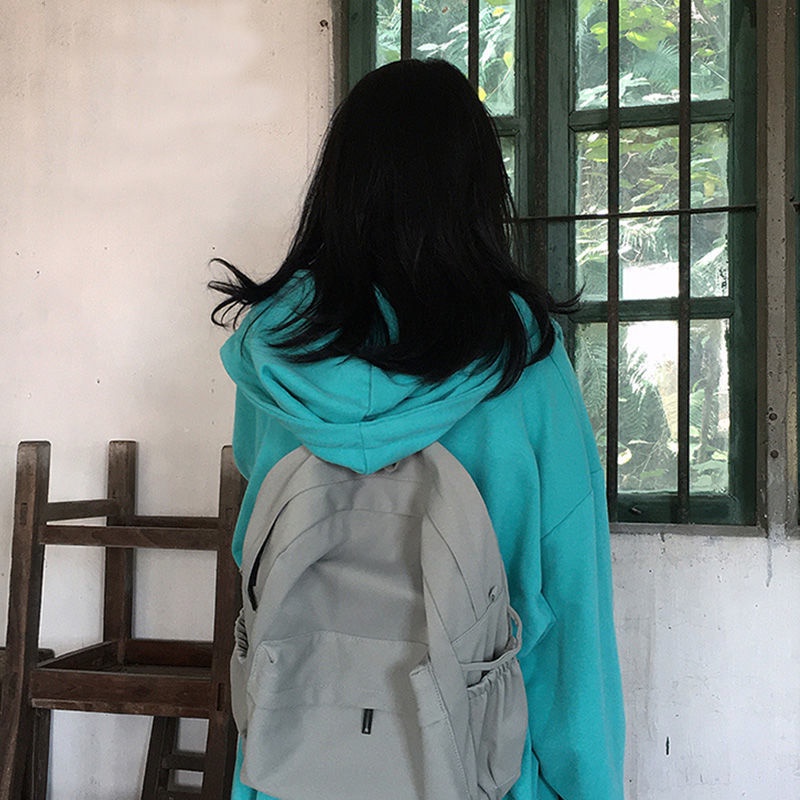 Tas sekolah wanita versi Korea warna solid kecil segar sekolah tinggi siswa ransel kampus di departemen Fengsen ransel sederhana wanita