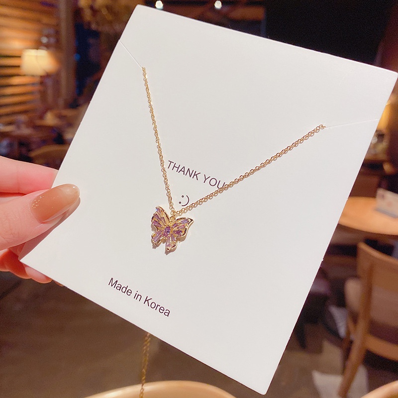 Kalung Rantai Klavikula Bahan Titanium Steel Desain Kupu-Kupu Ungu Model Hollow Untuk Wanita