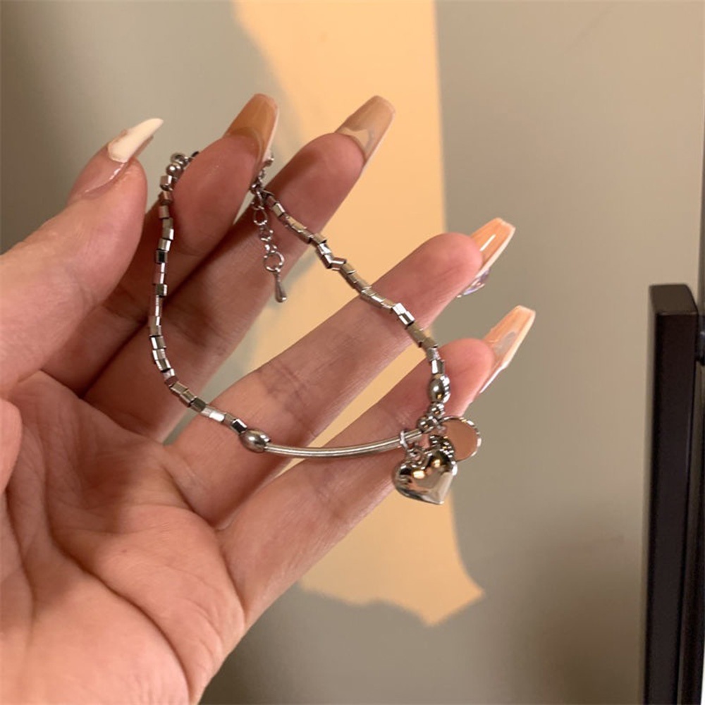 Gelang Liontin Hati Bahan Titanium Steel Gaya Korea Untuk Wanita