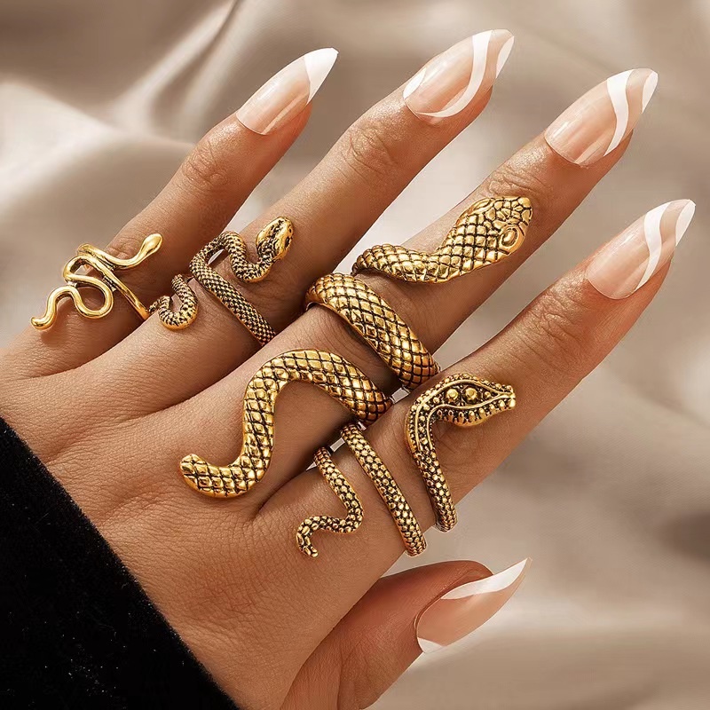 4pcs / Set Cincin Knuckle Adjustable Desain Hewan Ular Gaya Punk Gothic Untuk Unisex
