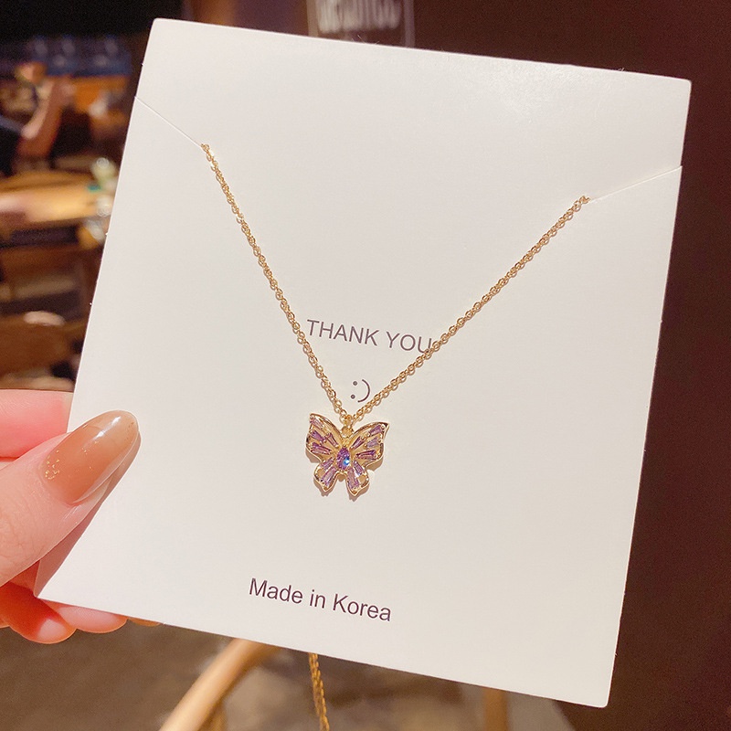Kalung Rantai Klavikula Bahan Titanium Steel Desain Kupu-Kupu Ungu Model Hollow Untuk Wanita