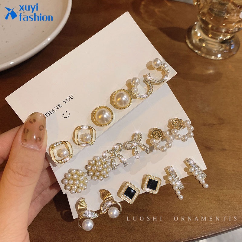 Set Anting Stud Desain Daun Bunga Tulip Pita Kristal Mutiara Warna Emas Untuk Wanita