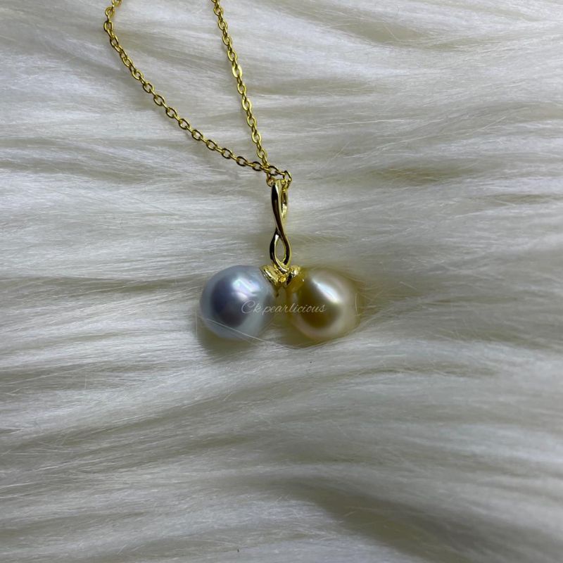 Liontin 2 Mata Mutiara Air Laut Papua Asli/Lapis Emas 18K. Hk Import.