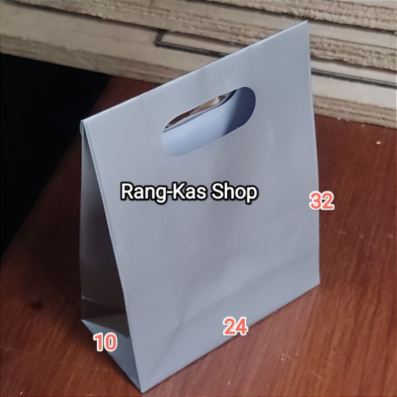 

Paperbag Amplop pita buku Silver 24x32 karton