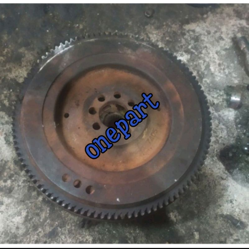 roda gila flywheel kijang diesel 2L original
