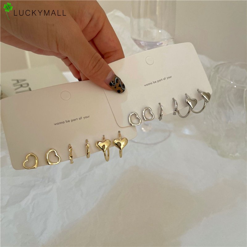 Anting Stud Bentuk Hati Model Hollow Warna Emas Silver Gaya Korea Untuk Wanita