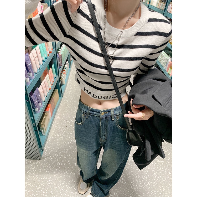 Bahu depan pendek hitam dan putih bergaris sweater wanita awal musim gugur manis dan keren desain lengan panjang slim-fit top sweater bottoming kemeja