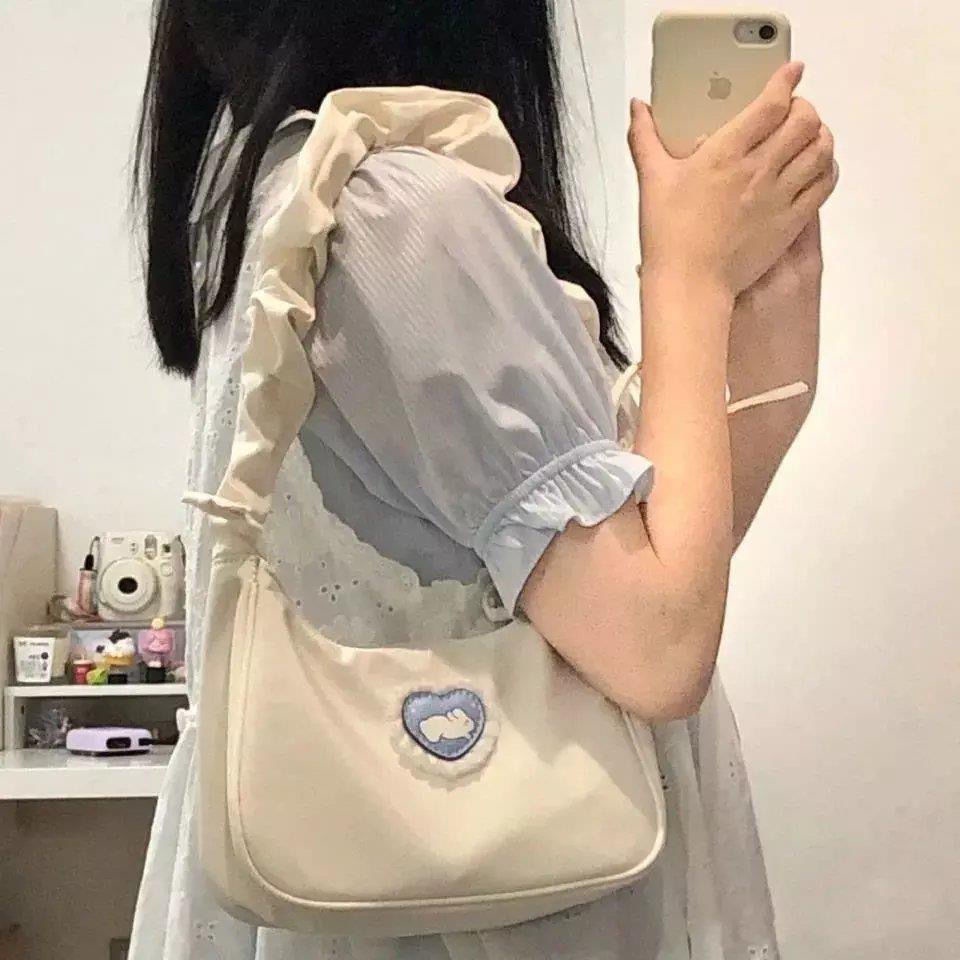 sera 2022 new love rabbit design sense tas ketiak wanita musim panas tas bahu tas sabit lipat lucu tas serut