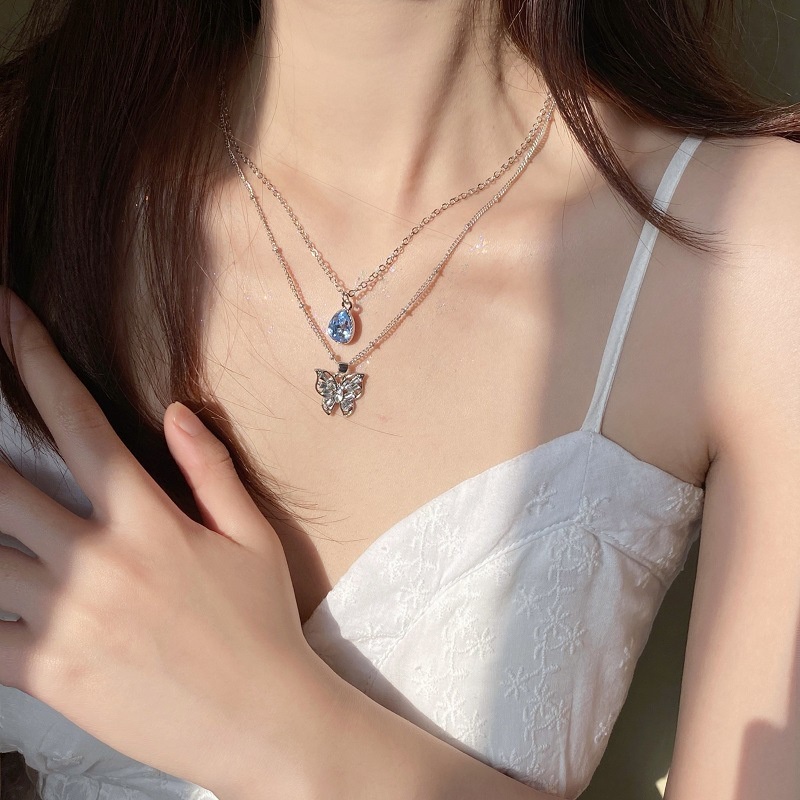 Kalung Rantai Klavikula Desain Kupu-Kupu Water Drop Bahan Zirkon Warna Biru Untuk Aksesoris