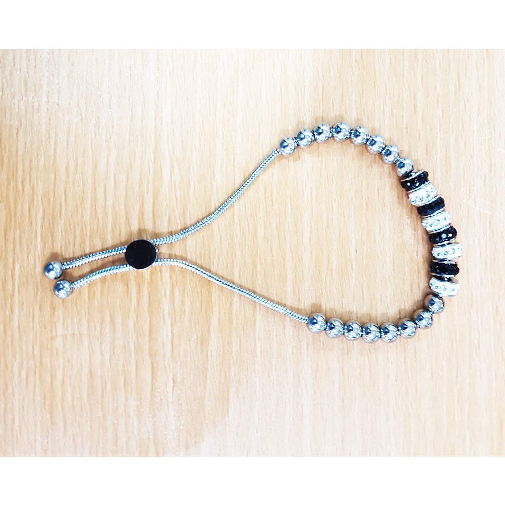 GELANG TANGAN SERUT BOLA KOMBINASI PUTIH & HITAM BRAND TERNAMA, BESI PUTIH ASLI AMBON, TIDAK BERKARA